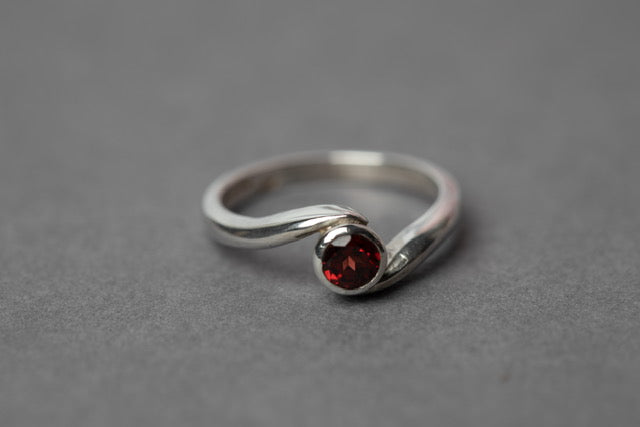 Garnet embrace ring