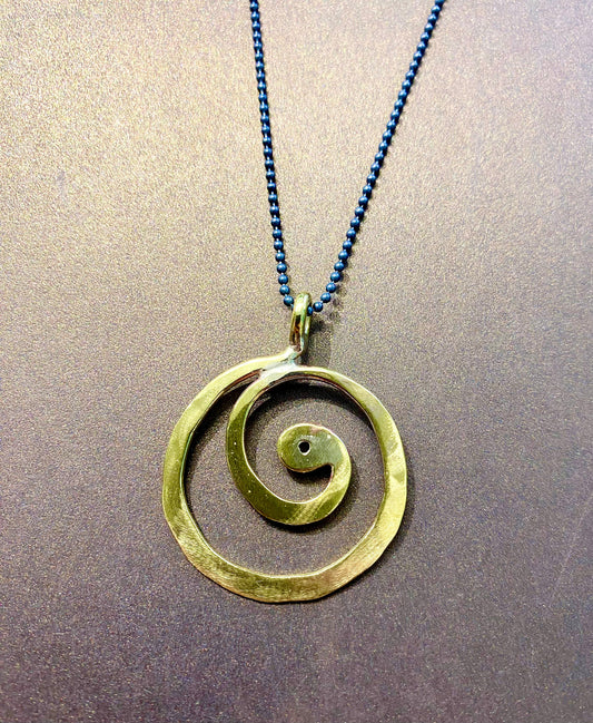 Brass swirl pendant