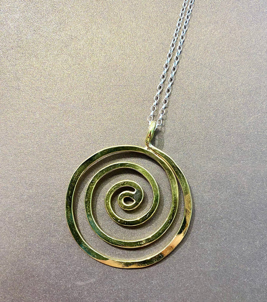 Brass swirl pendant