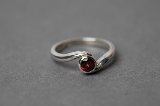 Garnet embrace ring