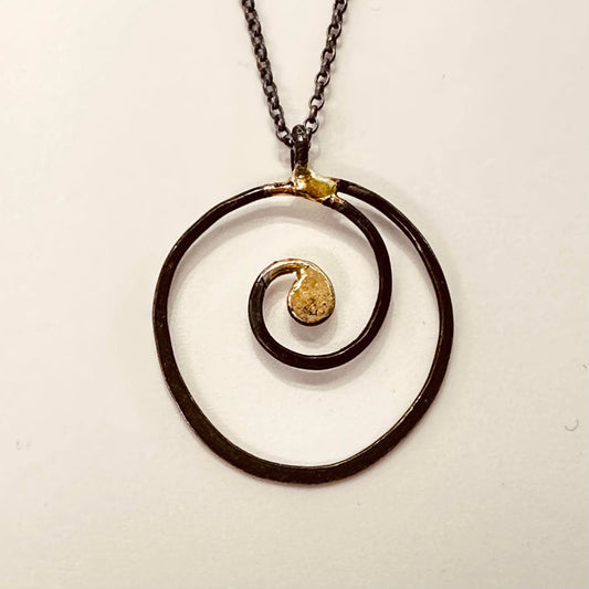 Iron scroll pendant